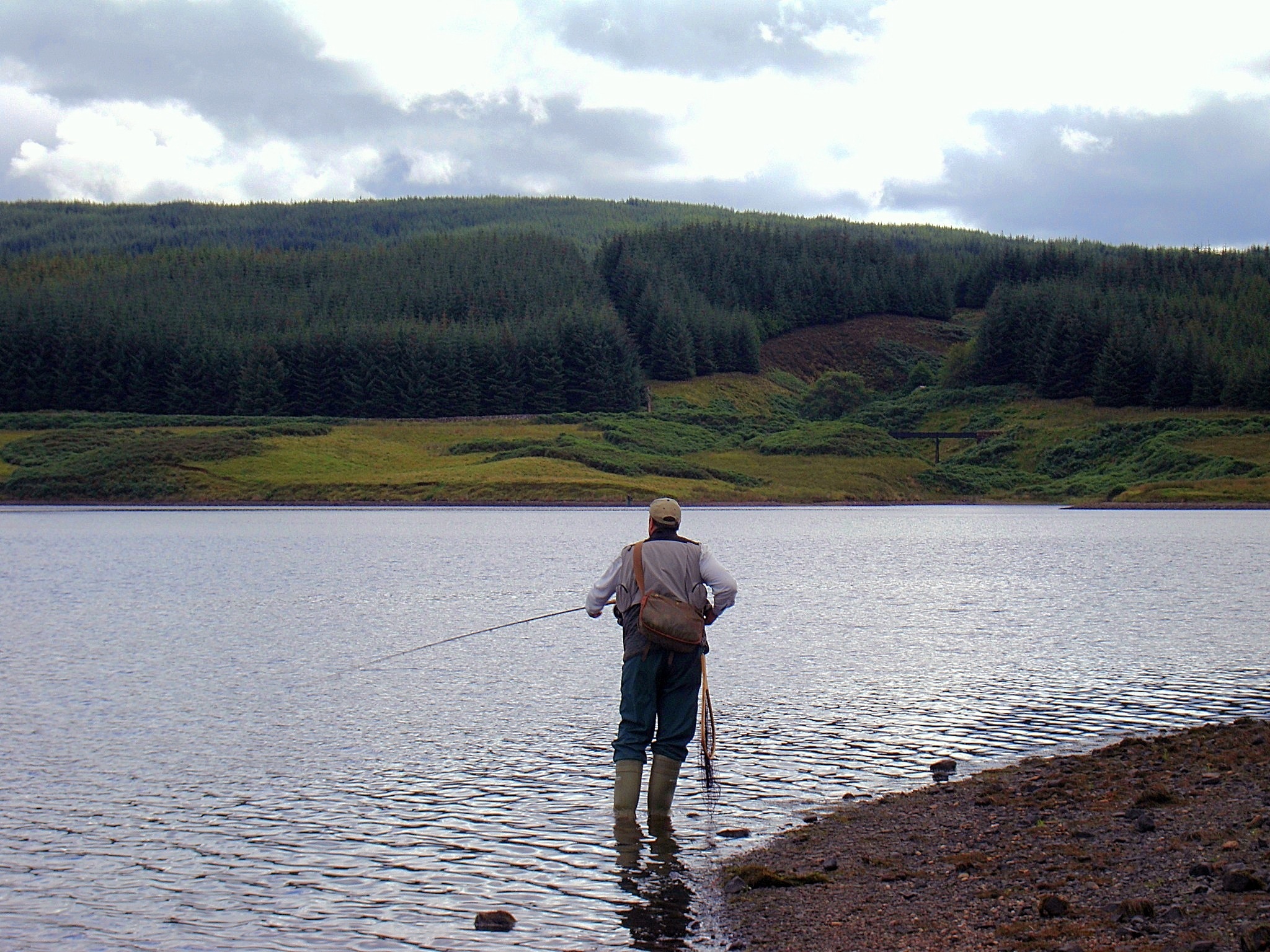 Angler Fishes The Ripple At The Boat House Point