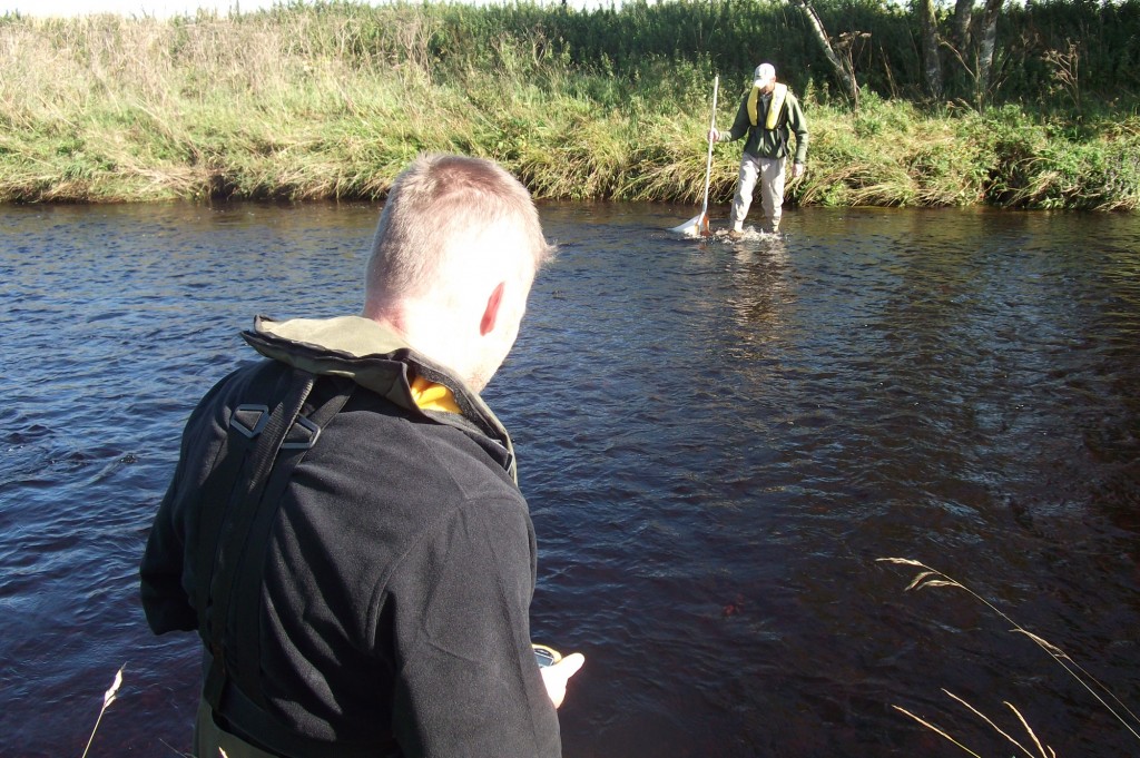 Andrew collects a sample while Graeme tries to figure out how a stopwatch works!